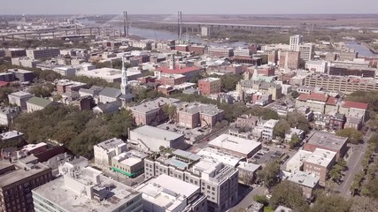 Aerial flyover of downtown Savannah, Georgia, USA on a sunny day.