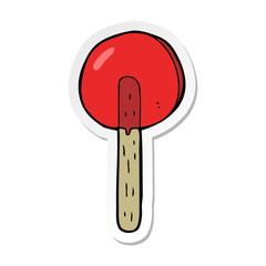 sticker of a cartoon lollipop