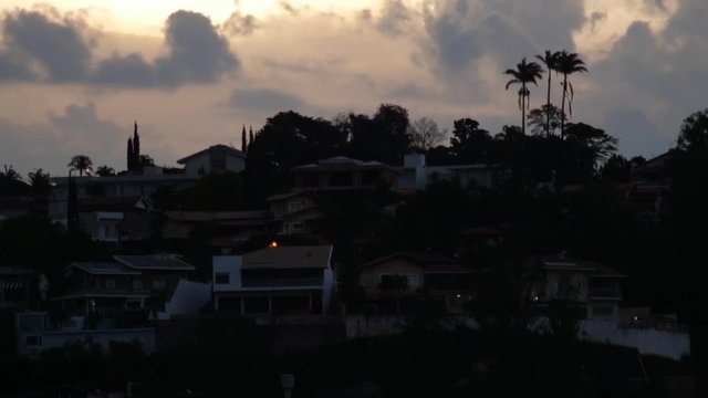 Time lapse videos of the city view with a magnificent sky background. with a multiple buildings in day and night.