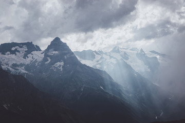 Panorama of mountains scene with dramatic blue sky in national park of Dombay