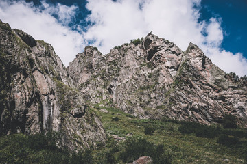 Panorama view of mountains scene in national park of Dombay, Caucasus, Russi
