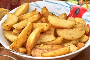 Fried Potatoes in the Oven. Plate of Idaho Hot Chips