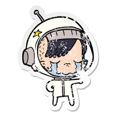 distressed sticker of a cartoon crying astronaut girl