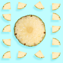 Pineapple Slices on Pastel Tropical Blue Background. creative design
