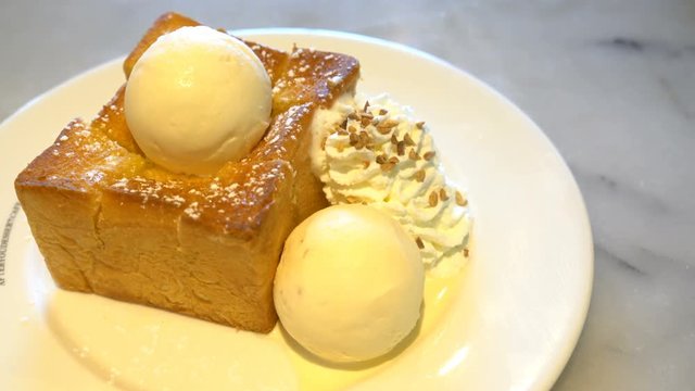 Gourmet honey toast on a white plate