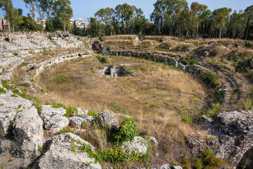Fototapeta na wymiar Ruins of ancient Roman ampheteater in Syracuse, Sicily