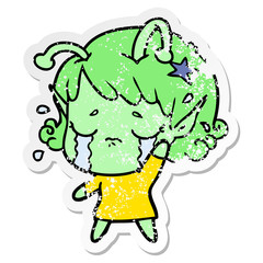 distressed sticker of a cartoon crying alien girl