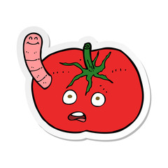 sticker of a cartoon tomato with worm