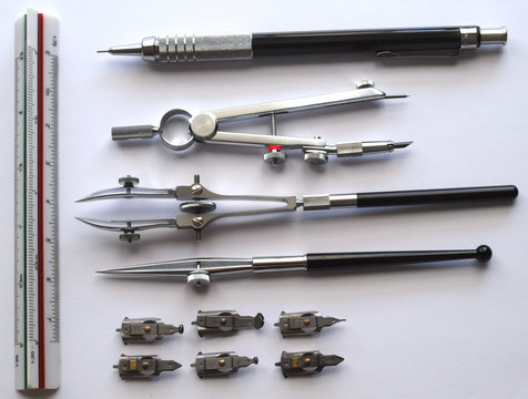 vintage classic drafting drawing tool set: ruler pens, ruler, mechanical pencial, technical nibs and compas