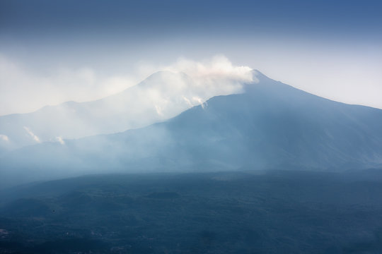 The famous view of Etna volcano from historical city Taormina, Sicily