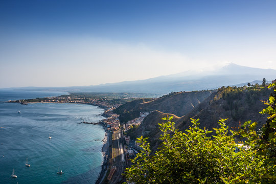 The famous view of Etna volcano from historical city Taormina, Sicily