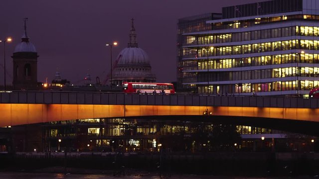 St. Paul's Cathedral and London bridge in the evening.