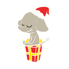 flat color illustration of a smiling elephant wearing santa hat