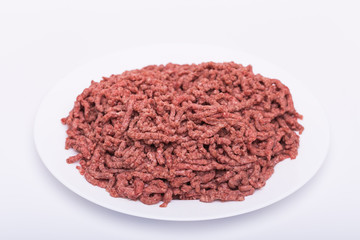Food, national cuisine and delicious concept - isolated raw minced beef