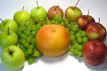 Apples, grapes, grapefruit. How much juiciness and vivid taste in these beautiful, tasty gifts of nature.