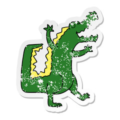distressed sticker of a quirky hand drawn cartoon crocodile