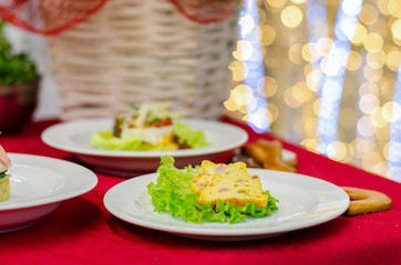 Cheese bread with ham served on the plate 