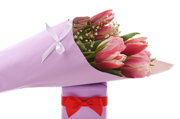 Bouquet of tulips with a gift.