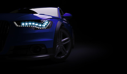 Stylish car on a black background with led lights on. Futuristic modern vehicle head light xenon on...