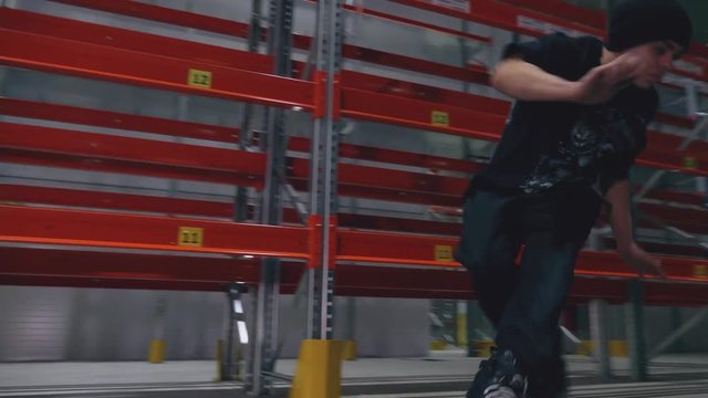 professional rollerskater does the trick at the logistic center and falls