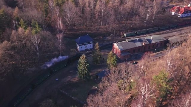 Aerial chase of a steam  train in Germany, near Zittau.