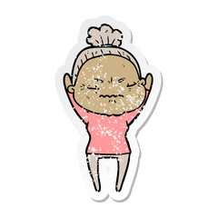 distressed sticker of a cartoon annoyed old lady