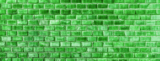 Green Brick wall texture close up.