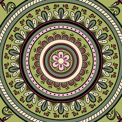 Circular ornament in pink-green tones