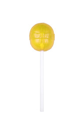 Yellow round lollipop isolated on white. Sweet sugar candy