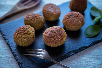Vegan croquettes on slate stone