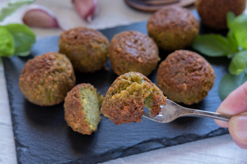 Vegan croquettes on slate stone