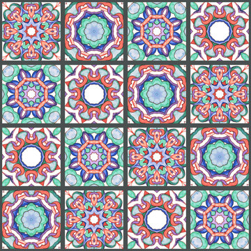 Watercolor seamless pattern with ethnic geometric motifs in style of Spanish Azulejo. Abstract fishnet Oriental arabesques in delicate pink, green and blue shades for ceramics, textile and pacaging