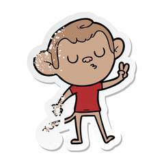 distressed sticker of a cartoon monkey
