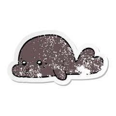 distressed sticker of a cartoon baby seal