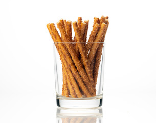 Sesame sticks on a white background