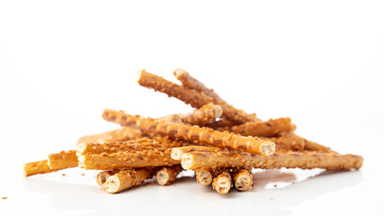 Sesame sticks on a white background