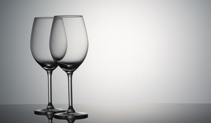 Glasses with water on blue background