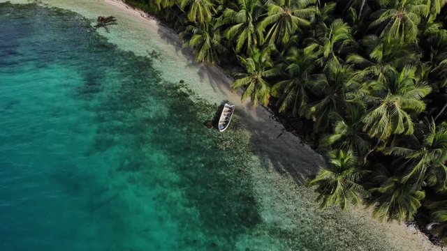 aerial pull back reveals tropical island paradise in San Blas archipelago Guna Yala Panama