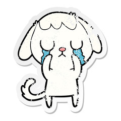 distressed sticker of a cute cartoon dog crying