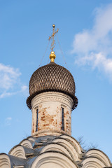 Domes with crosses of the Orthodox Church, blue sky.