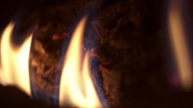 Fire closeup with embers glowing.