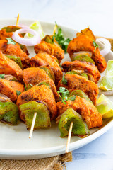 Indian Chicken Kebab - Chicken Tikka on Skewers Close Up Photo. Popular Indian Food andf Cuisine.