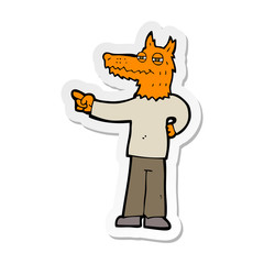 sticker of a cartoon pointing fox man
