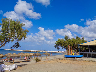 Fototapeta na wymiar beach with parasols and chairs