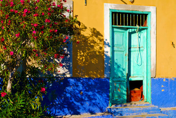 old house with blue door