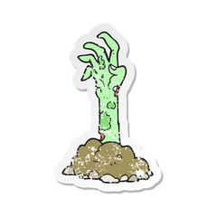 retro distressed sticker of a cartoon zombie hand rising from ground