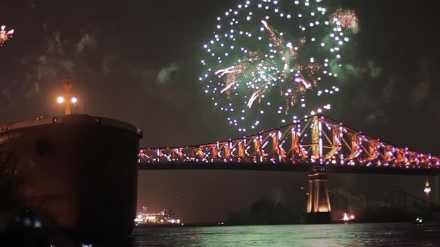 Light and fireworks show at Jacques Cartier bridge in Montreal, Quebec, Canada during summer season - night time.