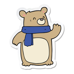sticker of a cartoon bear wearing scarf