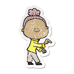 distressed sticker of a cartoon happy old woman
