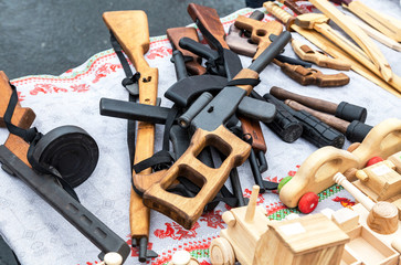 Different handmade wooden toy guns